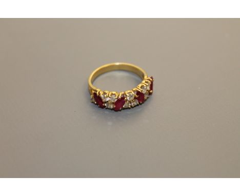 An 18ct gold ruby and diamond ring