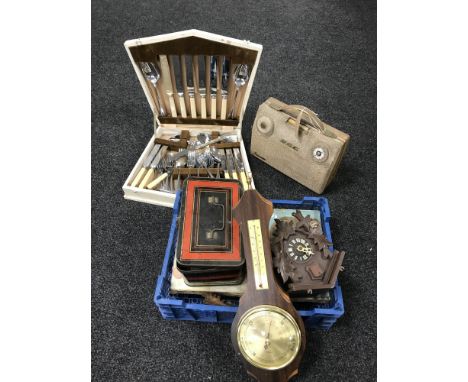 A vintage GEC radio, canteen of cutlery and a basket of games, buttons, barometer, cuckoo clock etc 