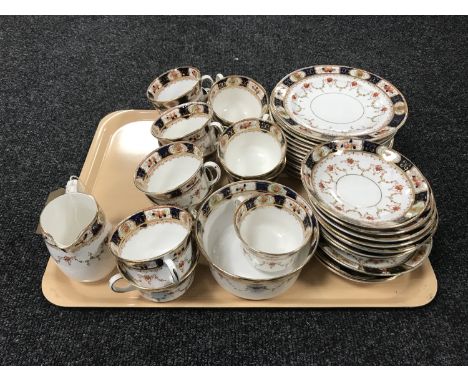 A tray of forty-one piece Melba tea service 
