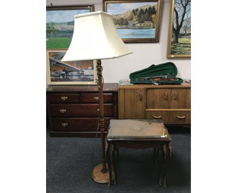 A nest of two tables with gilt-metal mounts and a standard lamp 