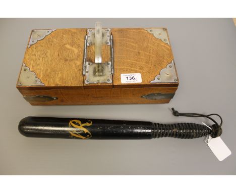 A Victorian style police truncheon and an oak two-division cigarette box with silver plated mounts