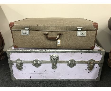 A metal bound trunk and a vintage luggage case 