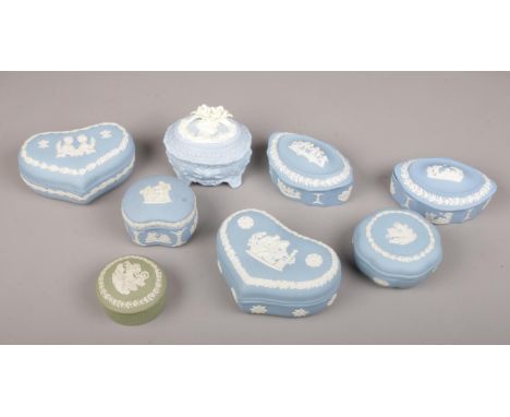 Seven Wedgwood Jasperware trinket boxes and a similar.  
