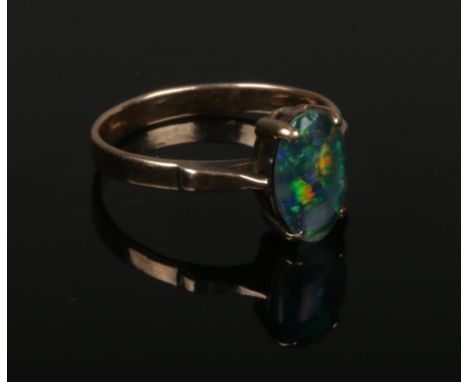 A vintage 9ct (tested unmarked) opal triplet ring. Size K 1/2.  