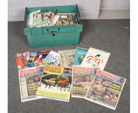 A box of paper ephemera to include 1990's / 2000's football programmes, boxing news papers, vintage magazines etc.  