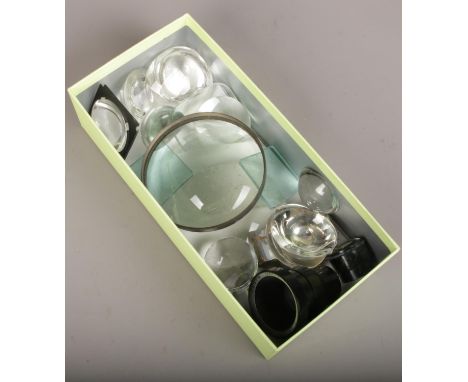 A box of glass microscope lenses.  