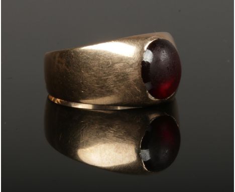 A Gentleman's 19th century Continental gold signet ring set with carnelian. Inscribed John J. Coughtan. Gross weight 5.96 gra