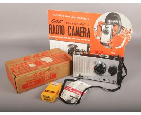 A boxed G.E.C Transistomatic Radio Camera, along with shop advertising card.  