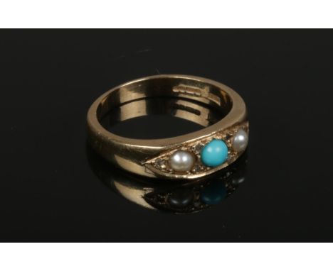 A 9ct gold pearl and turquoise ring in a boat shaped setting. Size L.  