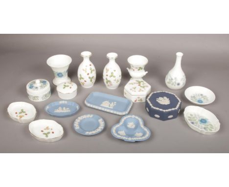 A collection of Wedgwood trinket boxes, pin dishes and bud vases. Including Jasperware, Wild Strawberry and Clementine patter