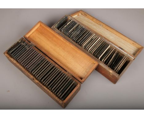 Two wooden boxes of magic lantern slides to include religious, nursery rhymes etc.  