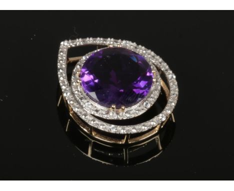 A 9ct gold amethyst and diamond pendant of tear drop form, 4.4 grams, 27mm.  