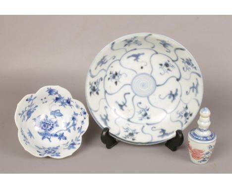 A Chinese Tek Sing cargo blue and white dish with label for Nagel Auctions, a ducai scent bottle with spurious Kangxi mark an