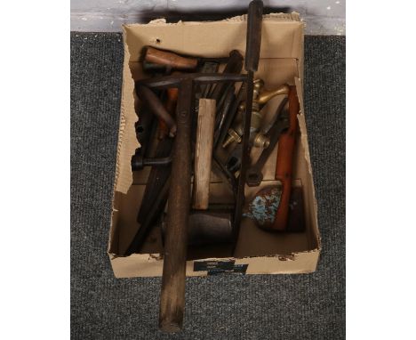 A box of hand tools to include mallet, small pick axe etc.  