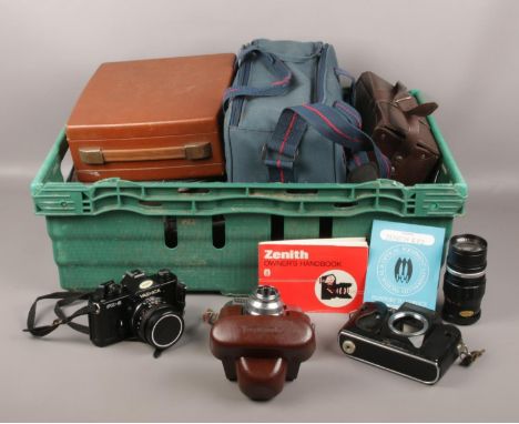 A box of camera's and equipment, Yashica FX-3 camera, Vuighander Vito BL camera,  Zenith E. F2 (81059314) camera with owners 