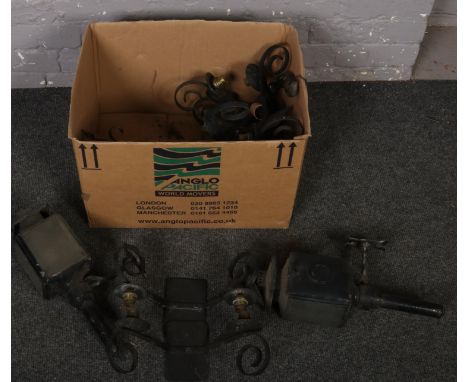 A box of old metal light fittings.  