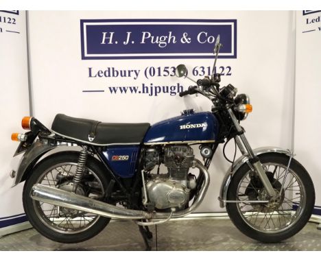 Honda CB250 motorcycle. 1974. 247cc.Frame No. CB250G6013256Engine No. CB250E-6012619Engine turns over. Has been dry stored an