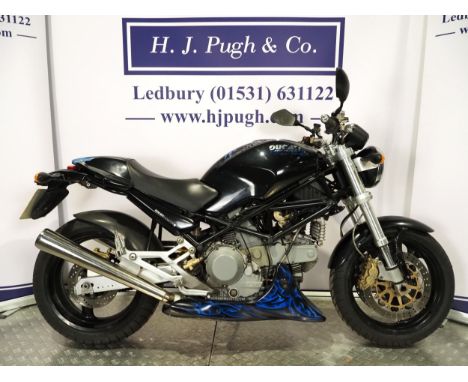 Ducati M900 Monster motorcycle. 2002. 904cc. Runs and rides. Fitted with a Conti silencer and finished with custom paint by e