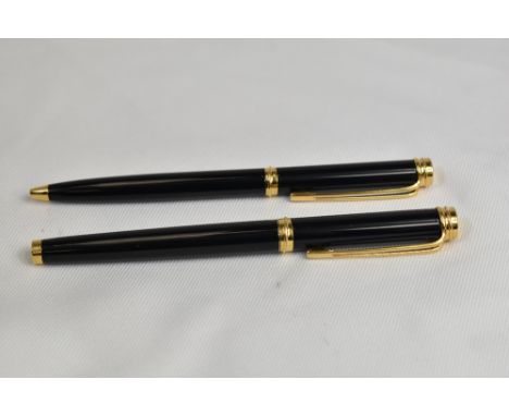 A Waterman CF Converter fill fountain pen and Ballpoint pen set in black with gold trim having Waterman nib. In Very Good con