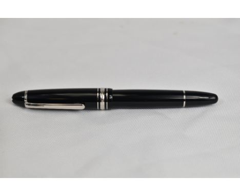 A Montblanc Meisterstuck 146 piston fill fountain pen in black with one broad and two narrow  bands having Montblanc 4810 nib