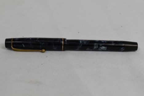 A De la Rue Onoto the Pen 5601 piston fill fountain pen in blue marble with single narrow band to the cap having an Onoto 3ST