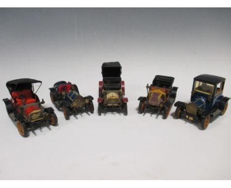 Five Schuco clockwork tinplate 'Old Timers' veteran or vintage cars, including Opel, Ford, Mercedes and Renault (one steering
