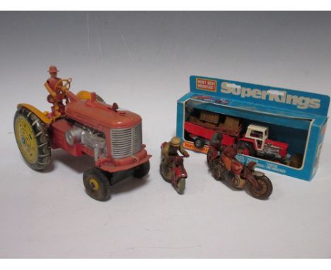 Matchbox K35 MF tractor and trailer in window box, Schuco Mirakomot tinplate motorcycle, another CKO (lacking arms), and a mo
