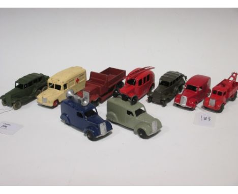 Dinky Toys: two Loud Speaker vans (grey and blue); red breakdown truck; red van; Daimler ambulance; fire engine; two army per