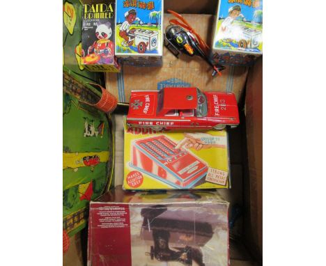 Various tinplate toys including Mettoy portable typewriter, Peter Pan Adding Machine, a Japanese Fire Chief Car, gold game to