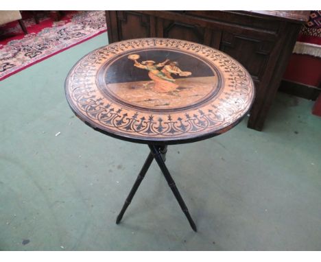 A 19th Century Sorrento ware tripod table, the top inlaid with tamborine players, ebonised turned supports