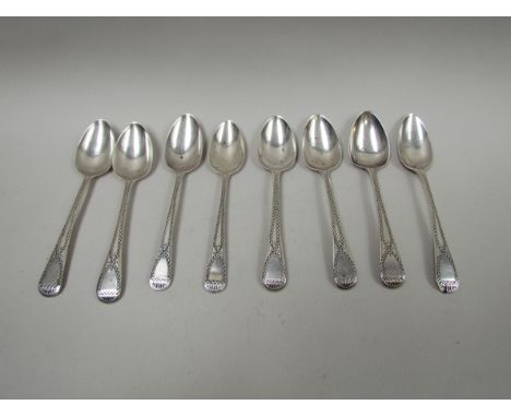 Eight Georgian silver teaspoons, bright cut detail, various marks, 125g