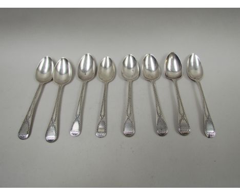 Eight Georgian silver teaspoons, bright cut detail, various marks, 125g