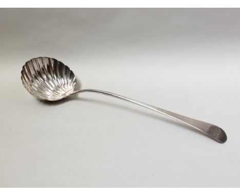 A George III silver Old English pattern soup ladle with fluted bowl.  London 1771, 143g