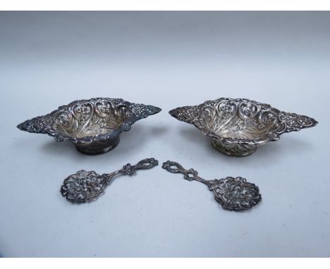 Two silver pierced dishes with floral detail and associated spoons, Birmingham 1893, 109g