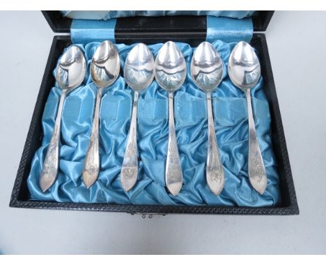 A set of six Harrison & Howson silver teaspoons with floral engraved handles, Sheffield 1943, 90.8g