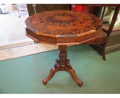 A 19th Century walnut specimen table on turned column and carved tripod legs 