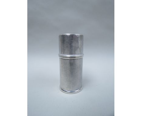 A silver lidded cylindrical container with engine turned detail marked Sterling Silver, 46g