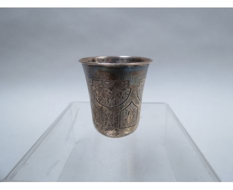 A Russian silver beaker marked 84, 4.5cm tall, 24g