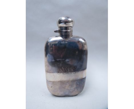 A Walker & Hall silver hip flask monogram to front, Sheffield 1936, 16cm long, dented, 170g