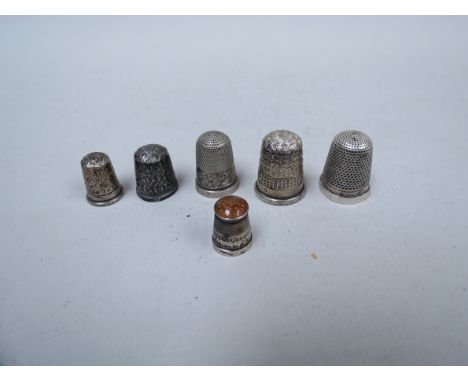 Six silver thimbles including Charles Horner