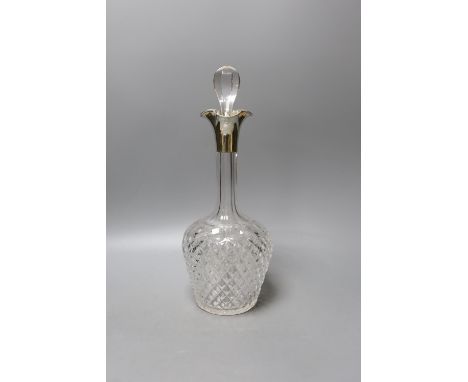 A late Victorian silver mounted cut glass decanter and stopper, John Grinsell &amp; Sons, London, 1900, 35.5cm.