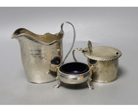 A George III silver cream jug, London, 1794, 10.3cm, a Georgian silver mustard pot and a Georgian silver salt.