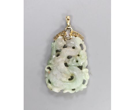 A Chinese jadeite Dragon pendant, the yellow metal mount stamped 14 K and set with diamond chips, overall 75mm, gross weight 