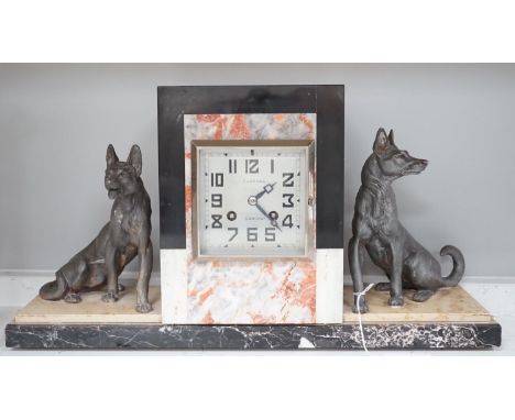 An Art Deco French spelter and marble mantel clock, 46cm wide