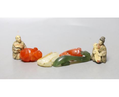 A 19th century Chinese pale celadon and russet jade carving of a cicada, 4.9cm, together with three other hard stone figures 