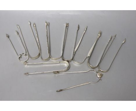 Ten assorted late 18th/early 19th century pairs of silver sugar tongs, various patterns, dates and makers, including two fire