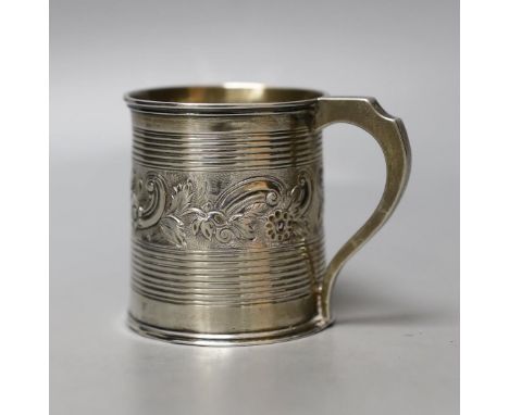 A William IV silver christening mug, with reeded and embossed decoration, London, 1834, 63mm, 98 grams