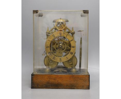 A 19th century brass twin fusee skeleton clock in perspex case with key and pendulum