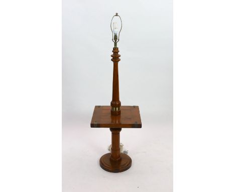 A pine and walnut standard lamp, with square mid tier, height 118cm