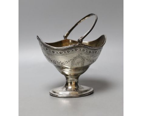 A George III silver oval sugar basket, maker C.S, London, 1787, width 12.1cm, 156 grams.